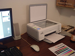 A white printer and a scanner in one